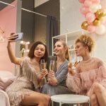 Beautiful Young Women Taking Selfie in Dressing Room